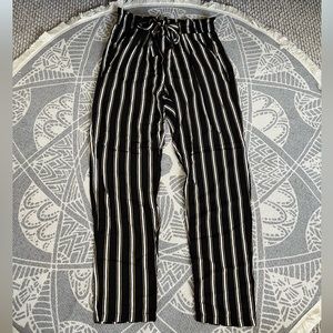 Ambiance Apparel size medium black, white, and yellow, striped long pants